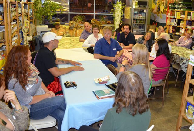 Charles Schmidt addresses patrons at Arnold's Way