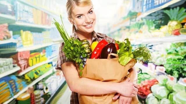 Woman shopping in produce department