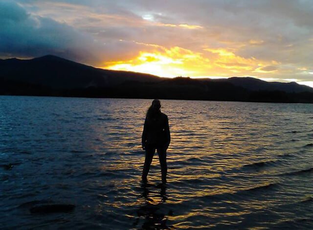 Esperanza Vite photographed while in a lake at sunset