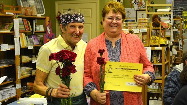Arnold Kauffman poses with Jean Campbell at the March 2014 graduation for the 30-Day Raw Challenge at Arnold's Way