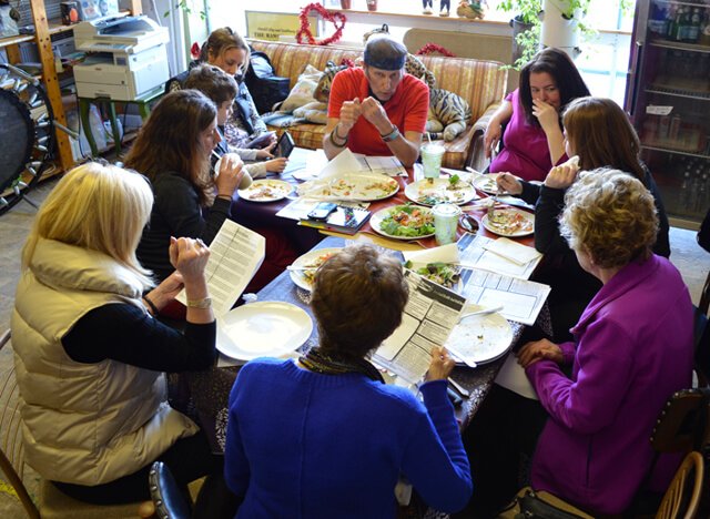 Arnold Kauffman talks to a group of women at Arnold's Way in February 2014