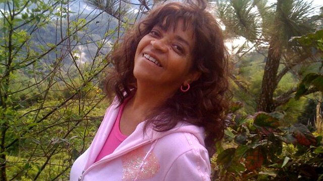 Toni Allen smiles in Jamaica