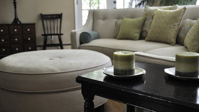 Candles and stain on tables and hardwood floor