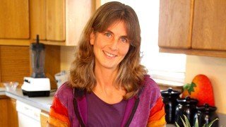 Ellen Livingston photographed in a kitchen