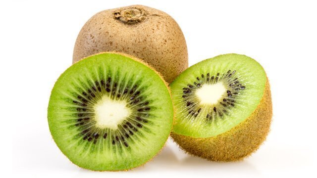 Kiwi in halves and whole against a white background