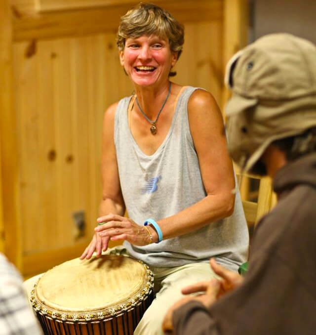 Itsy Sweeney plays bongos at the 2014 Woodstock Fruit Festival