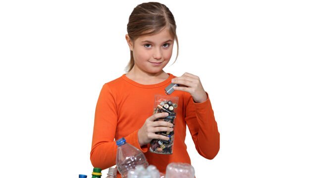 A young girl recycles batteries with plastic bottles in view