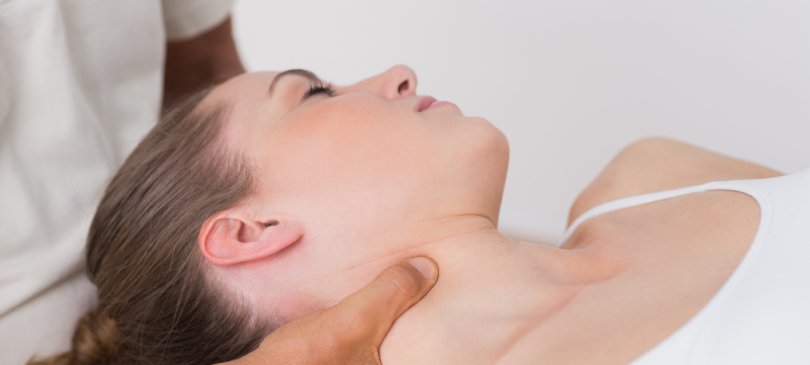 Gillespie Approach–Craniosacral Fascial Therapy Course - man gives female patient CFT - Fruit-Powered